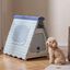 COSTWAY Caseta Perros para Exterior, Casa Plegable de Pl&aacute;stico para Perros con Puerta de Solapa Bloqueable, Ventanas, Base Elevada, Refugio Port&aacute;til Impermeable para Mascotas, 72 x 60 x 68 cm (Azul), , large indicador imagen numero 2
